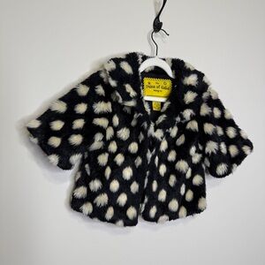 Black faux fur shrug, white dot print